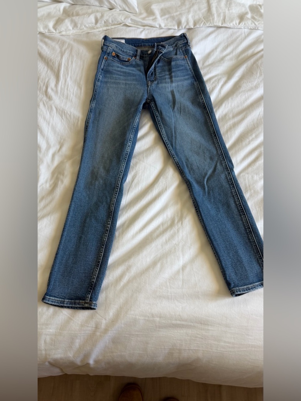 gap vintage high rise slim, size 26R, color is medium indigo